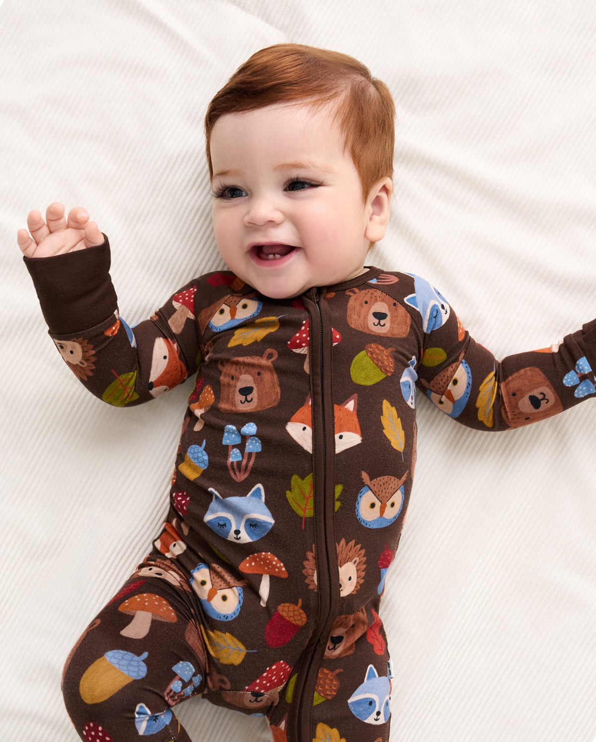 Forest Crew Zip Sleepsuit on a baby