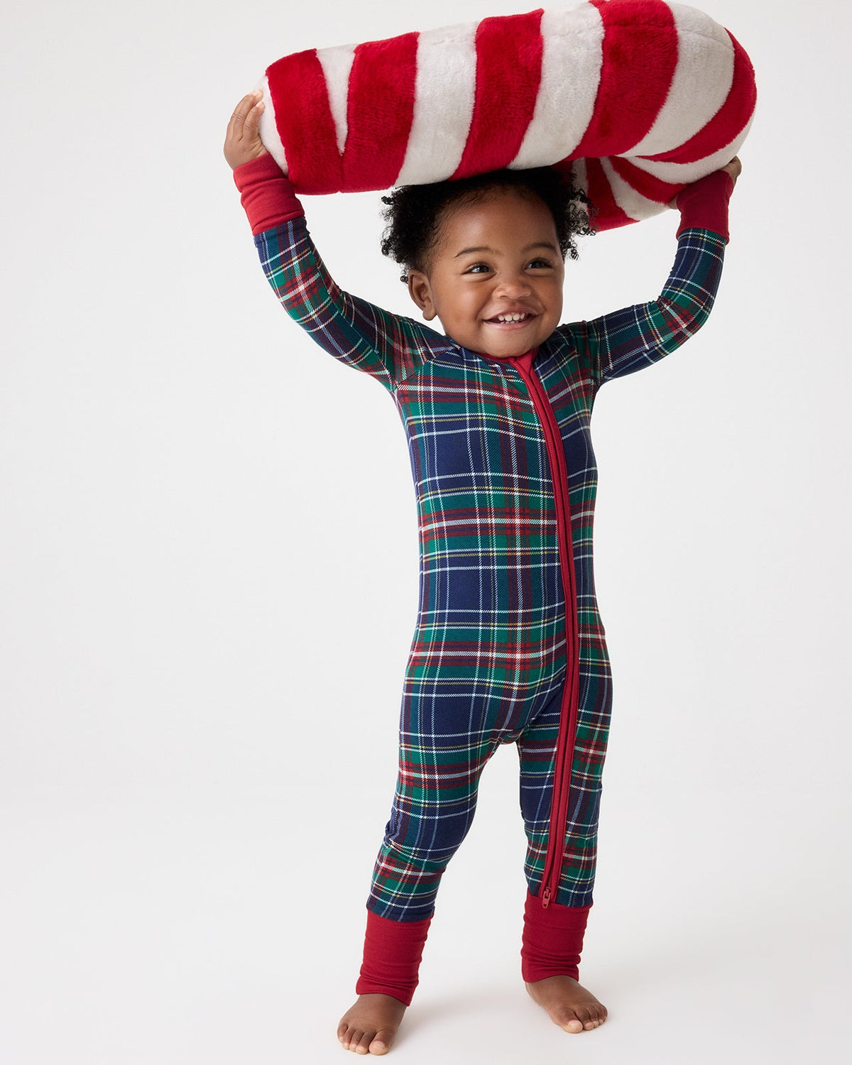 Northern Night Plaid Zip Sleepsuit on a baby