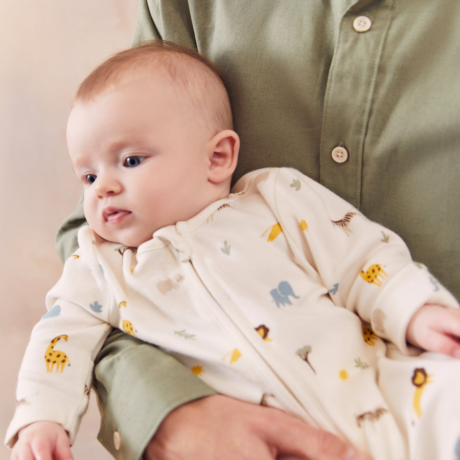 Safari Zip Sleepsuit on a baby